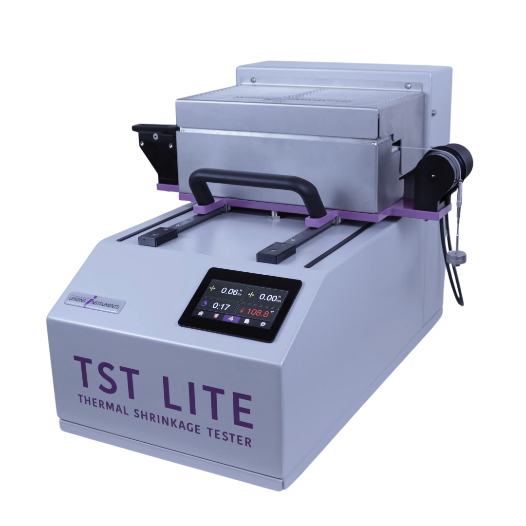 TST LITE front-side view with mounted sample and active display showing temperature, time and result.
